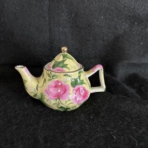 A special place, adorable miniature porcelain, floral tea pot.